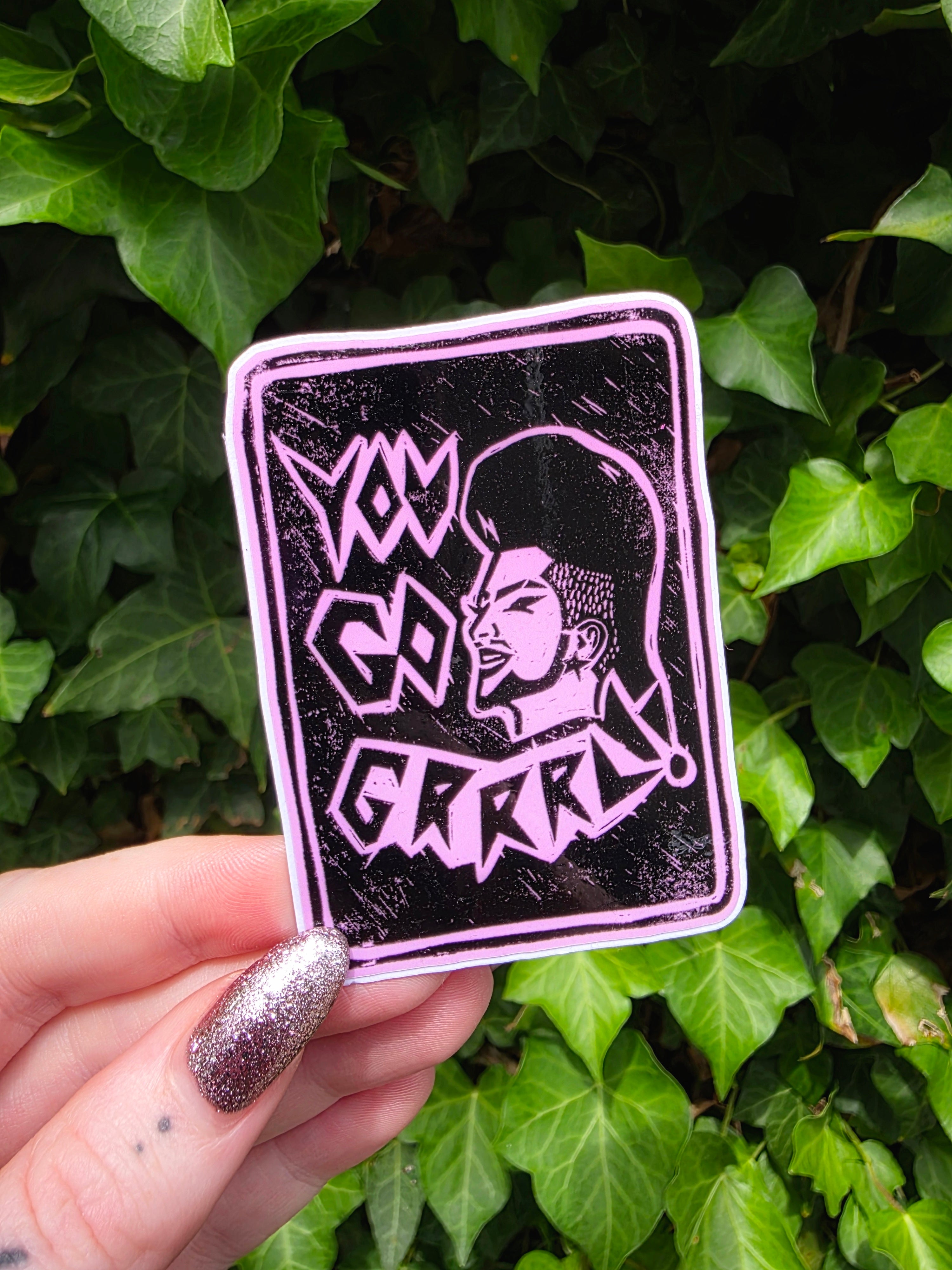 Black and pink “You Go Grrrl” sticker